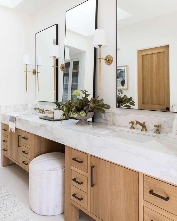 Love this beautiful modern bathroom design with a wood vanity and brass accents - bathroom remodel - bathroom ideas - master bathroom - bathroom decor - pure salt interiors - coastal decor - coastal bathroom
